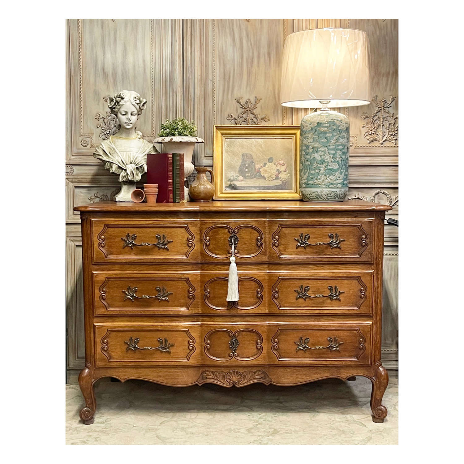 Ornate carved French chest of drawers