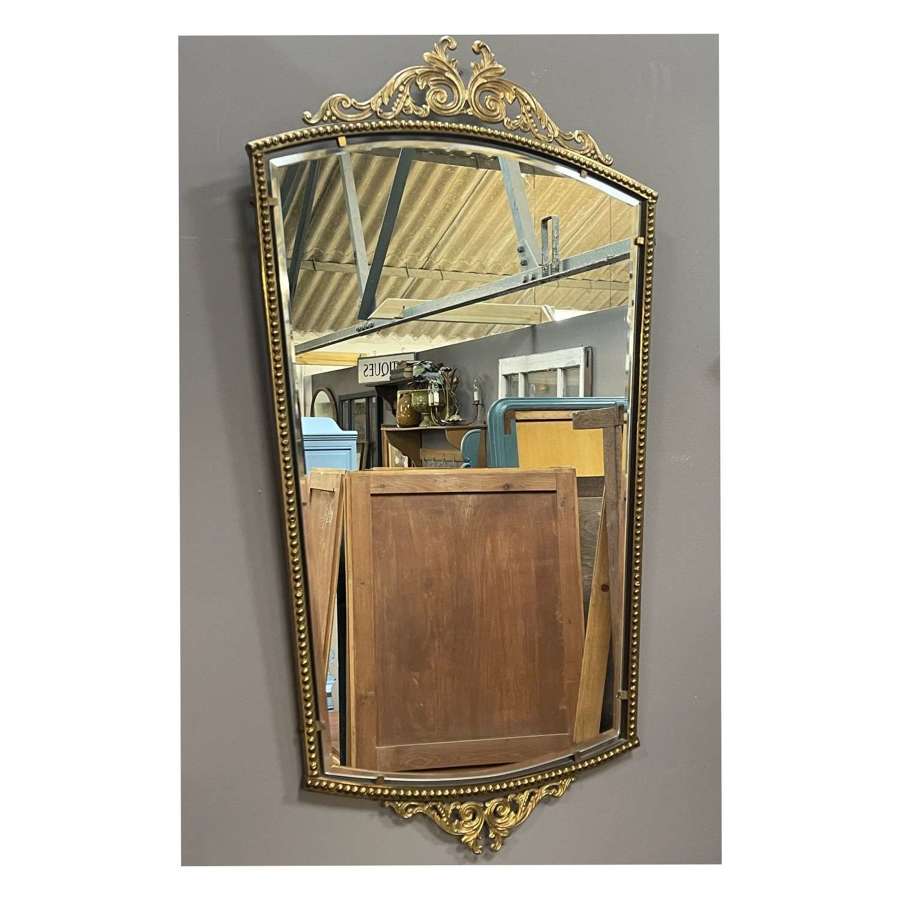 Vintage French brass framed bow top mirror